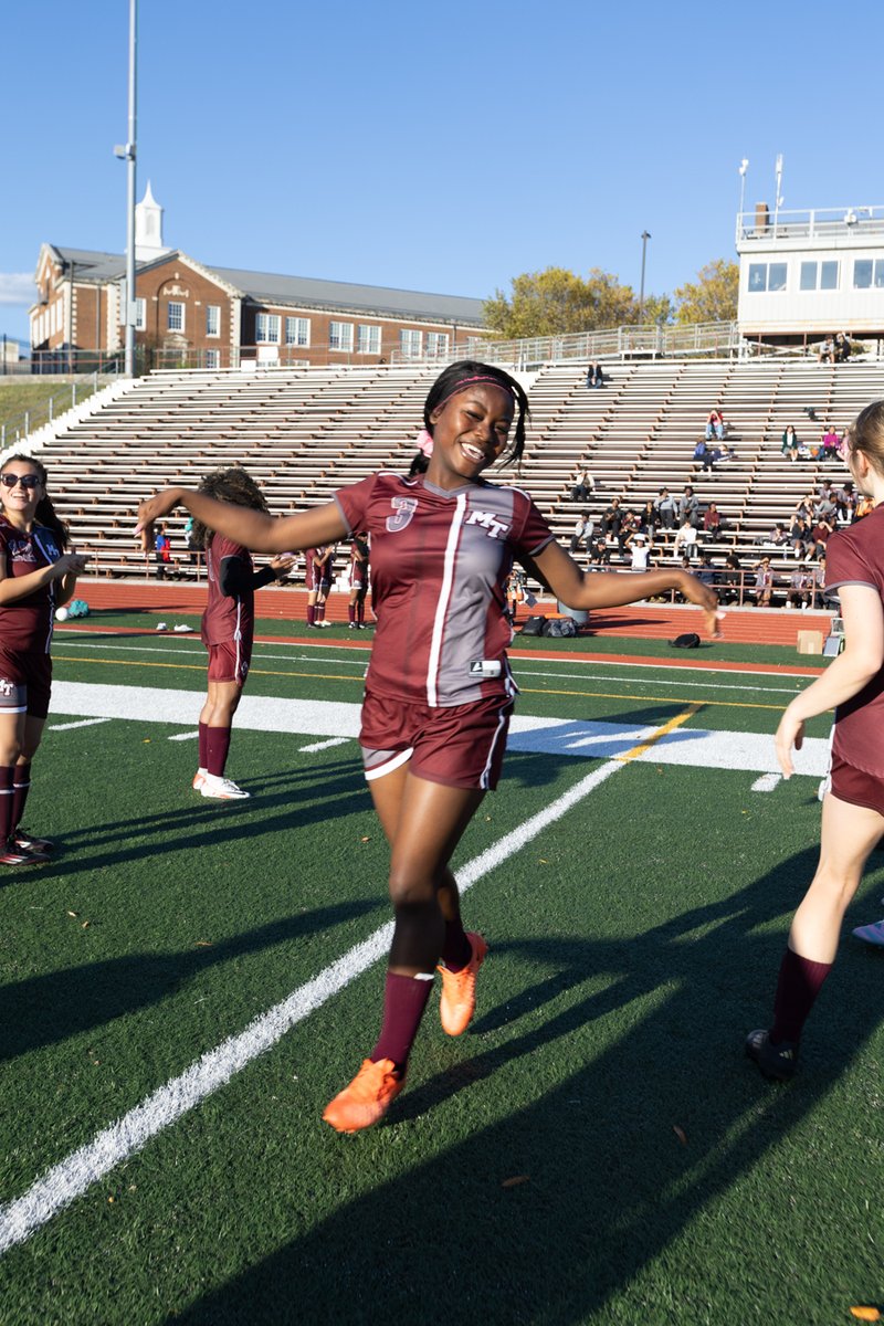 Soccer player sprinting on the field